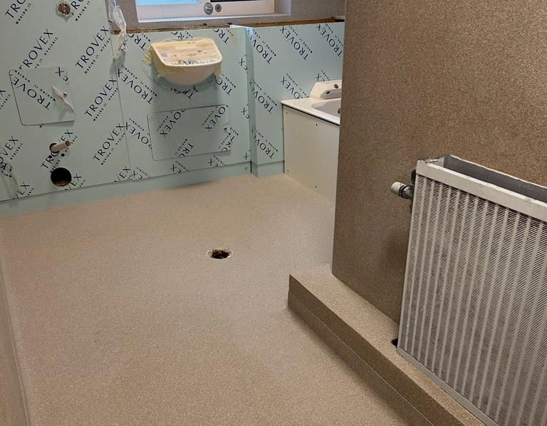 Central Flooring Services installs resin flooring in hospital mental health seclusion rooms